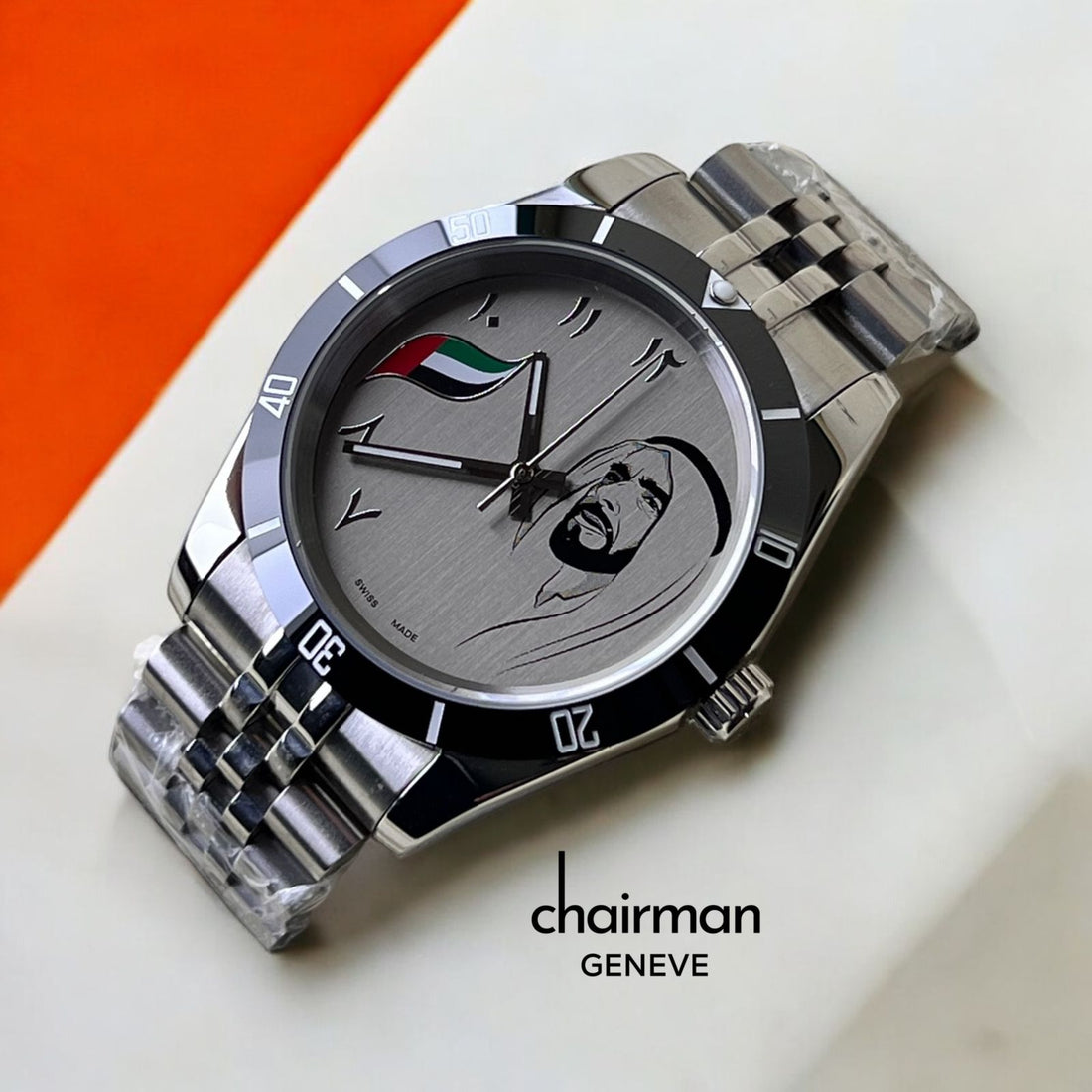 ساعة Chairman Geneve Swiss Made بمينا عربية وسوار فضي بعلم الإمارات العربية المتحدة
