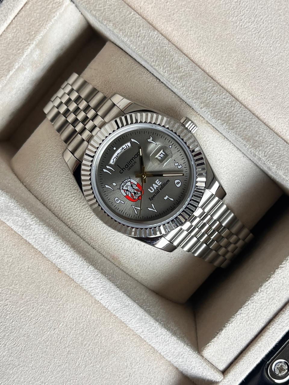 ABU DHABI Emblem Arabic Day And Dated Grey Dial Silver Chain Chairman Geneve Gents Watch
