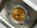 ABU DHABI Emblem Chairman Geneve Orange Arabic Dial Silver Chain Gents Watch