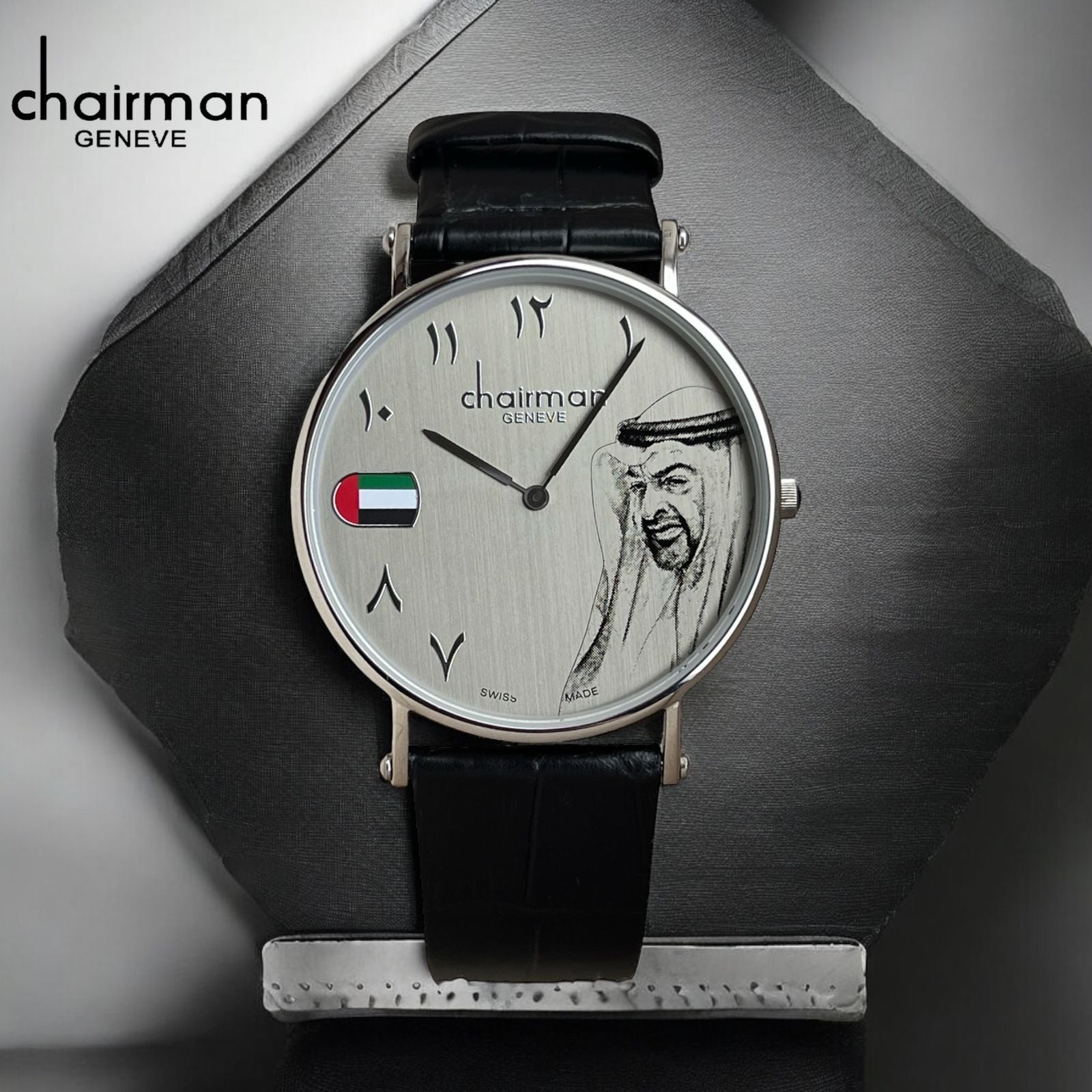 ساعة علم الإمارات العربية المتحدة بمينا عربية وسوار أسود من Chairman Geneve صناعة سويسرية ومينا رمادية للرجال